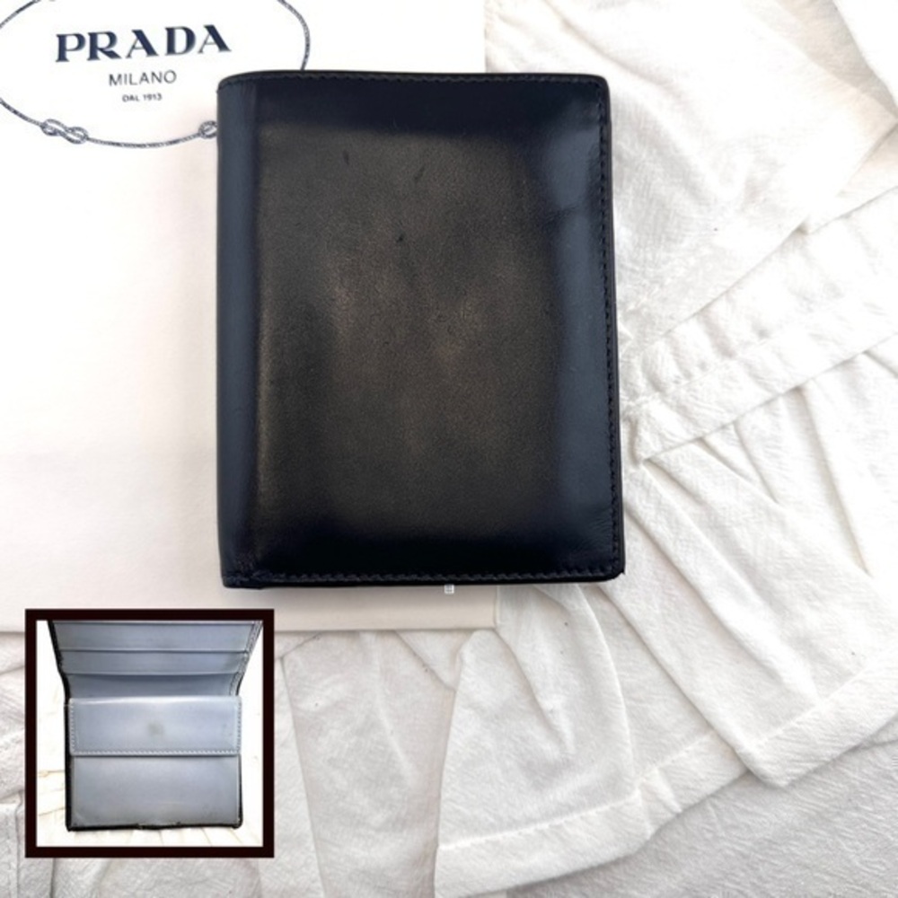 AUTHENTIC Prada wallet. Black with light blue interior.